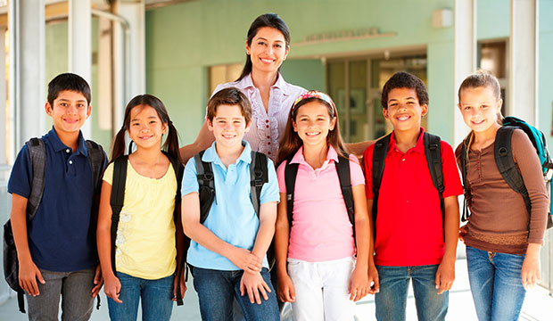 aba therapy program picture of teacher with kids